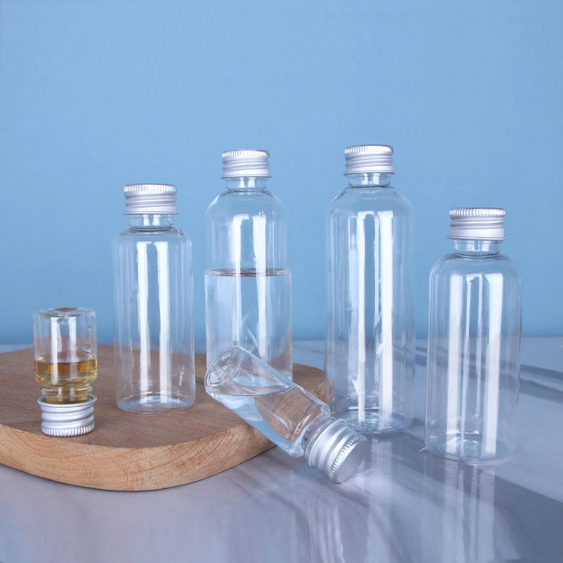 50 Uds 5ml 10ml 30ml 50ml 100ml botella de plástico tapa de aluminio botella de muestra de loción transparente contenedor cosmético vacío para viaje