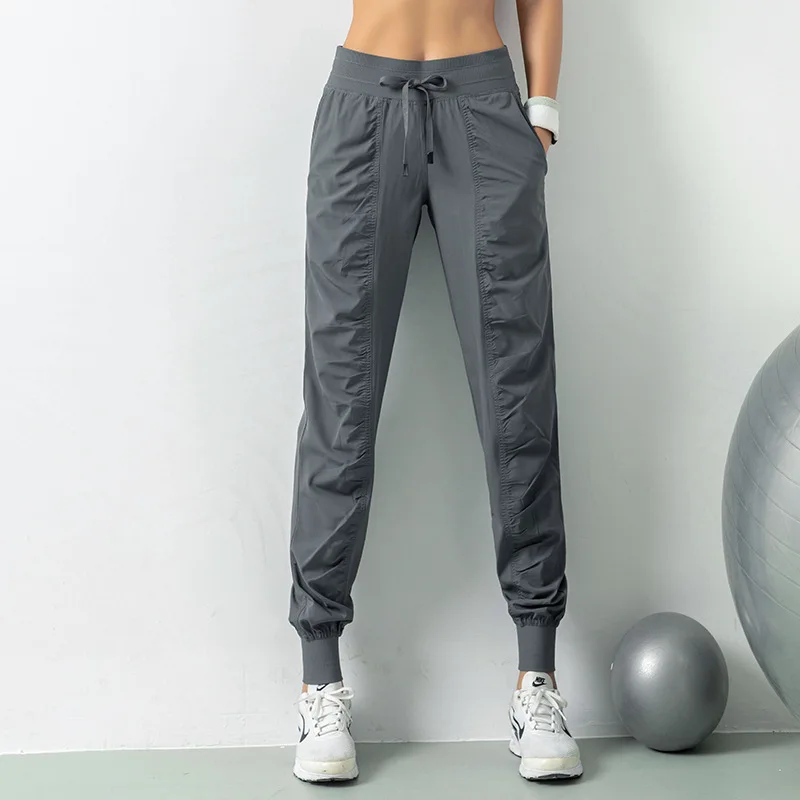 ริ้วรอยSlimmingฟิตเนสกางเกงกีฬาสตรีหลวมLeggingsกางเกงวิ่งสบายๆกางเกงแห้งเร็วกางเกงHarlanบาง