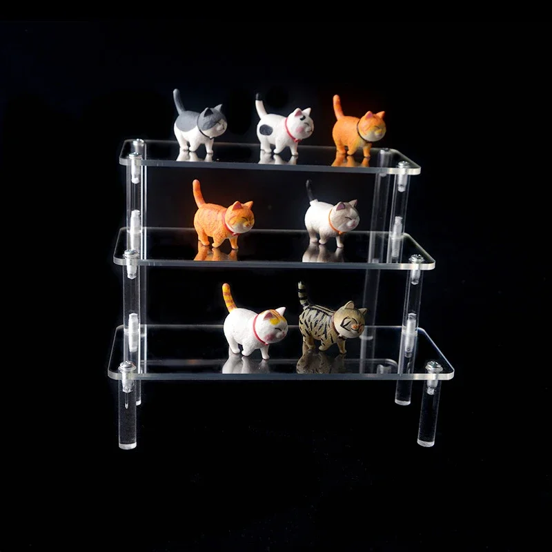 Espositore in acrilico a 1-4 livelli Espositore durevole per bambola di profumo per cupcake Scaffale di stoccaggio per scatola cieca trapezoidale trasparente