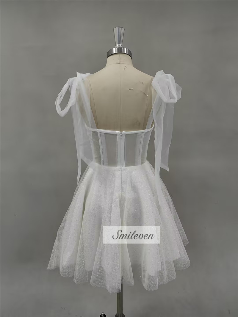 Smileven Abito da sposa corto Una linea con scollo a cuore Glitter lucidi Abiti da sposa Mini fiocchi Cinghia Vestido de novia 2024 Personalizzato