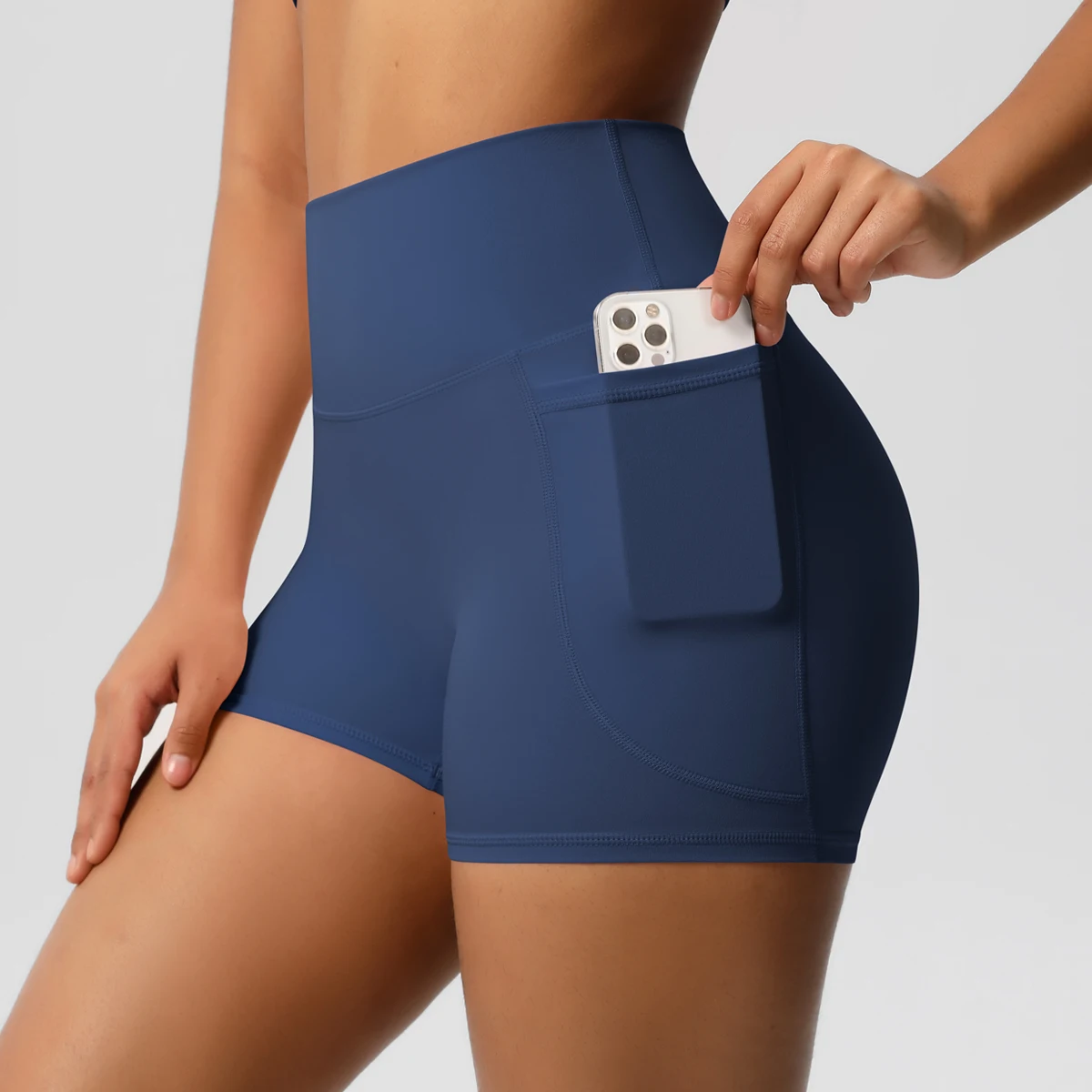 Pantaloncini sportivi da donna con tasche Pantaloncini legging da yoga Pantaloncini attillati fitness a vita alta a prova di squat Asciugatura rapida Allenamento in bicicletta Palestra