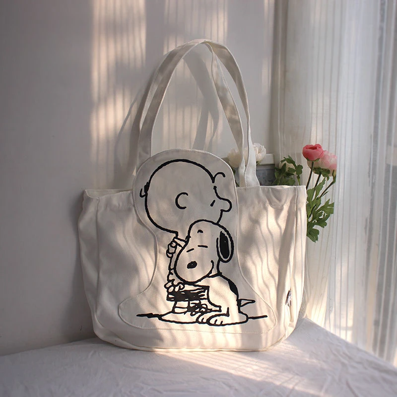 Nuova borsa a tracolla in tela Snoopy moda cartone animato Borsa a tracolla per lezione studentessa carina casual di grande capacità
