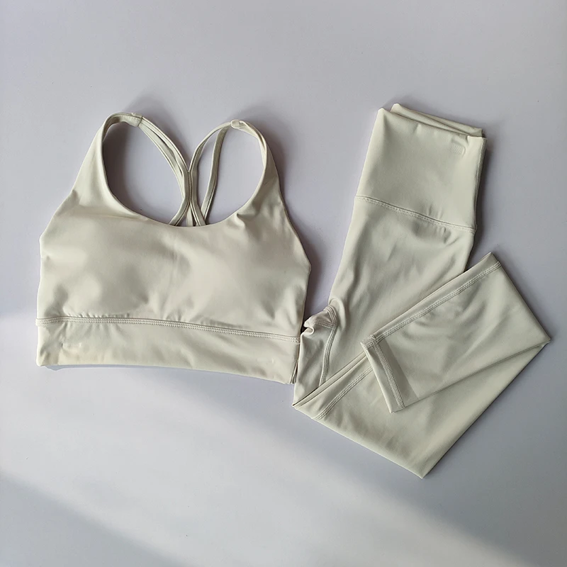 Traje de Yoga para mujer, sujetadores deportivos de gama alta, mallas adelgazantes para levantamiento de cadera, sujetadores y mallas deportivas para Fitness, camiseta sin mangas, conjunto transpirable