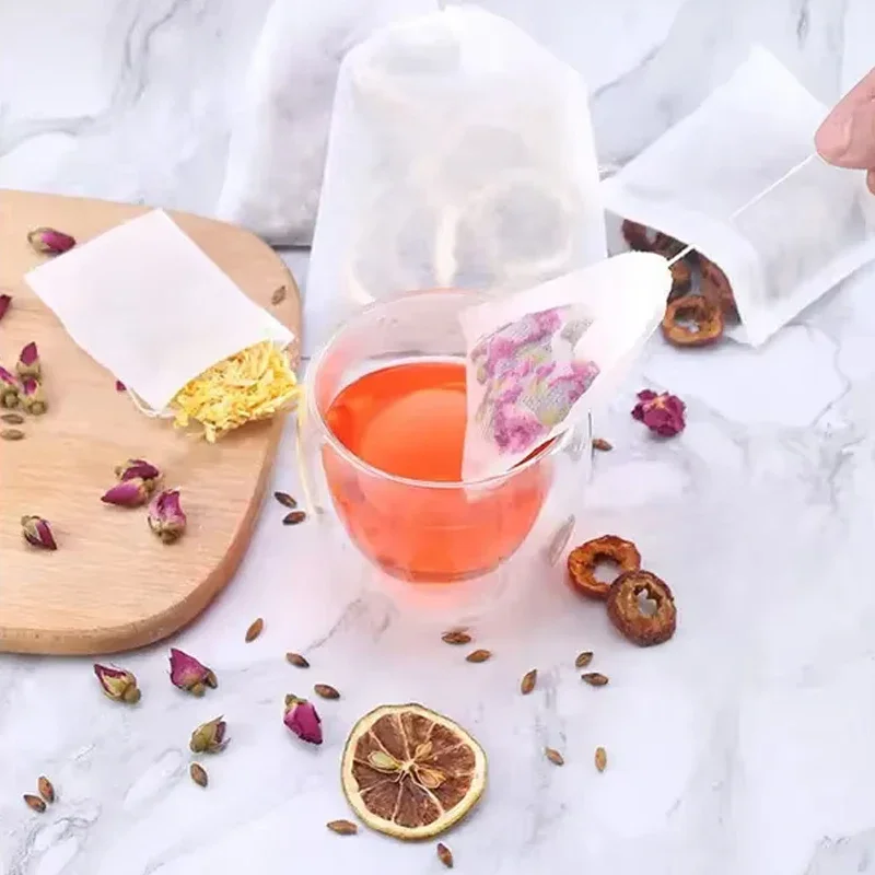 100 ชิ้นถุงชาแบบใช้แล้วทิ้งถุงกรองสําหรับชา Infuser กับ String Heal Seal เกรดอาหารไม่ทอผ้าเครื่องเทศตัวกรอง Teabags