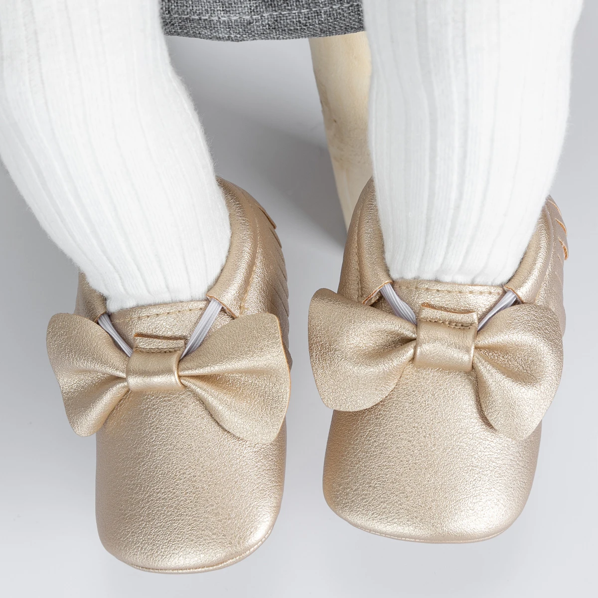 Meckior รองเท้าเด็กทารกแรกเกิดเด็กทารกสาว First Walker PU Sofe Sole เจ้าหญิง Bowknot Fringe เด็กวัยหัดเดินรองเท้าเปลเด็กสบายๆ