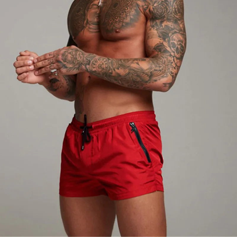 2025 Pantaloncini da bagno con cerniera tascabile da uomo nuovi Intimo da uomo Pantaloncini da spiaggia Set sportivo Pantaloncini da surf Pantaloncini da bagno da uomo