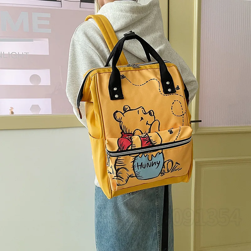 Disney winnie the pooh novo saco de fraldas mochila dos desenhos animados bonito mãe e bebê saco grande capacidade leve viagem mamãe saco