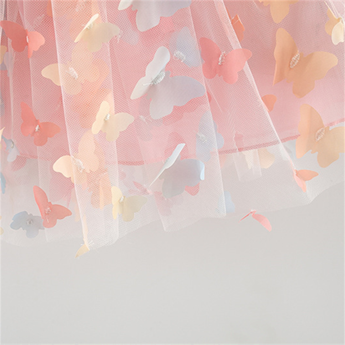 Abito a canotta da ragazza estiva con gonna soffice senza maniche con ali di farfalla patchwork in rete con stampa di farfalle arcobaleno