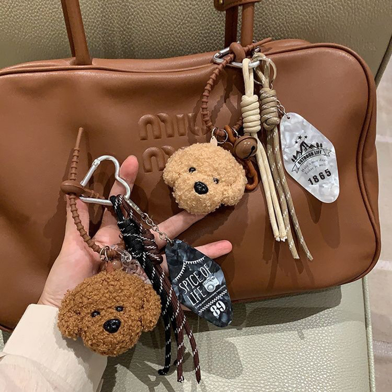 Lindo oso de peluche colgante Miu cuerda de escalada de viento cuerda de mano muñeca de dibujos animados bolsa colgante decoración llavero de coche de moda