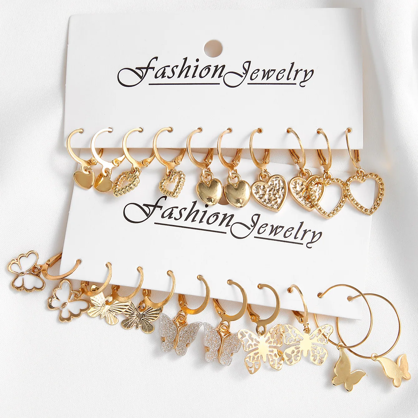 Nuevo conjunto de pendientes de aro de mariposa de Color dorado nuevo, pendientes colgantes huecos de corazón simples y creativos para mujer, joyería de moda