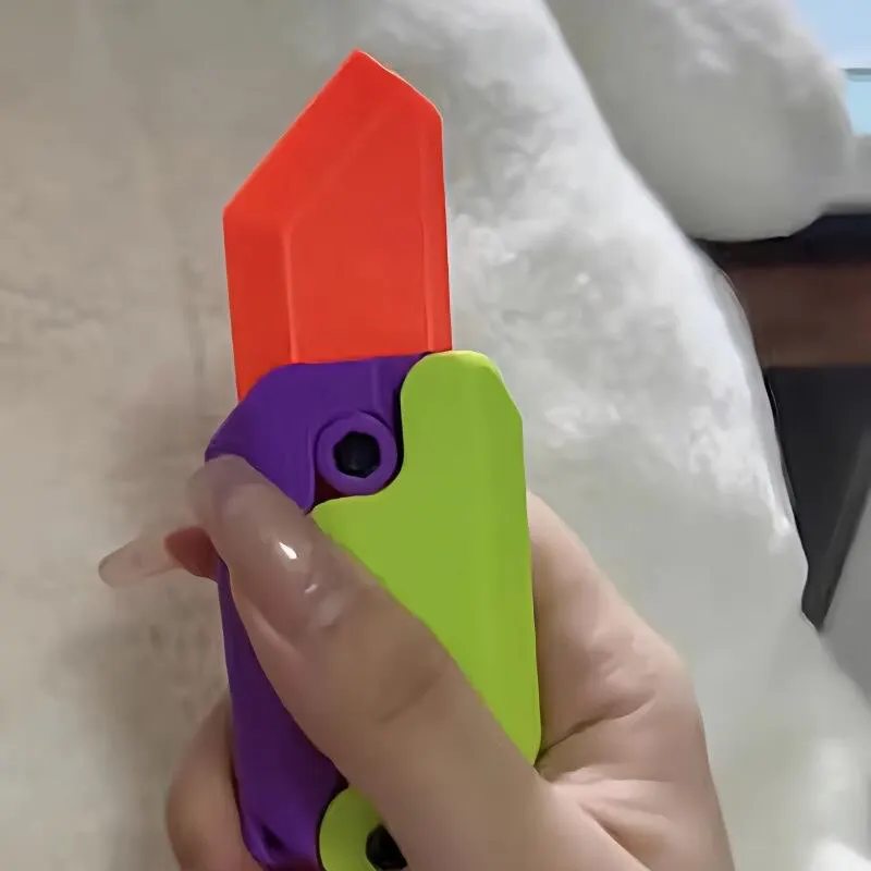 Zufälliges 3d Schwerkraft Rettich messer gerade Sprung Mini Bounce Modell Dekompression Spielzeug Kunststoff Spielzeug Messer