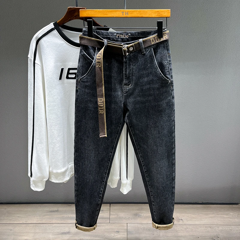Konische Jeans für Herren bekleidung Herbst neue Mode bestickte koreanische Harems hose lässige Stretch schwarze Jeans hose