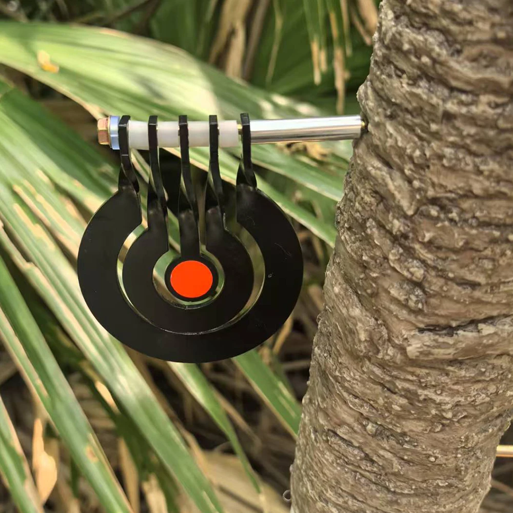 Shooting practice with a three - ring tree - inserted rotating pendulum target made of 3 - millimeter - thick metal