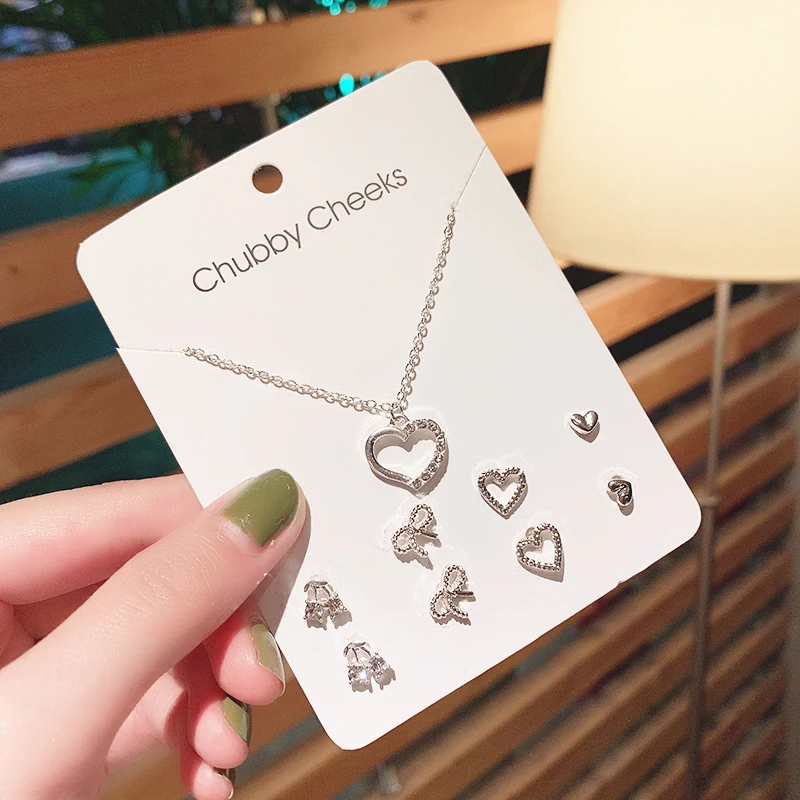 Juego de 4 pares de pendientes de corazón de Color plateado para mujeres y niñas, joyería exquisita para fiesta diaria, accesorios de regalo simples y bonitos