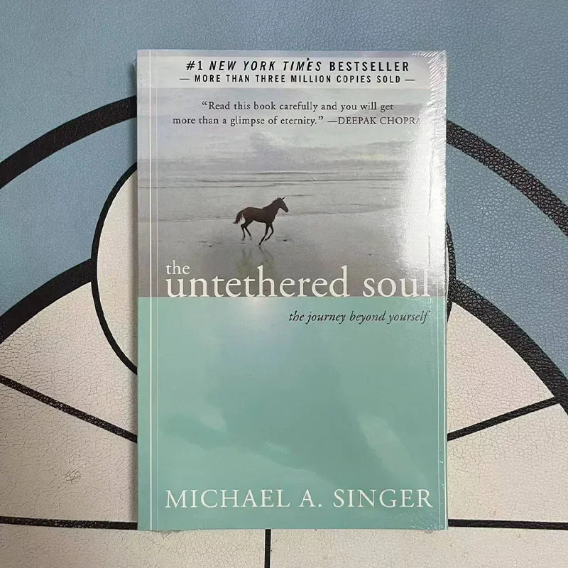 The Untethered Soul โดย Michael A. นักร้อง The Journey Beyond Yourself นวนิยาย # หนังสือปกอ่อนขายดีของ New York Times 1 เล่ม