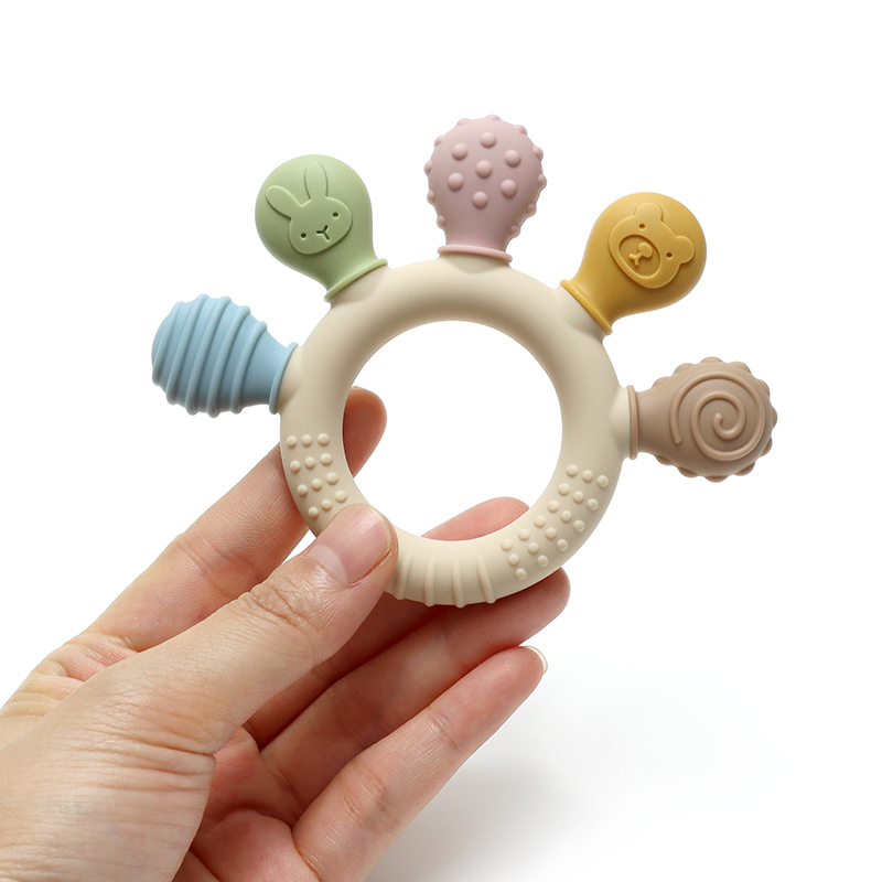 Neue hand multicolor Silikon Baby Ring Beißring Angst Zahnen Spielzeug 0-12 Monate Kauen Perlen Sensorische Zahnfleisch Relief schnuller Baby