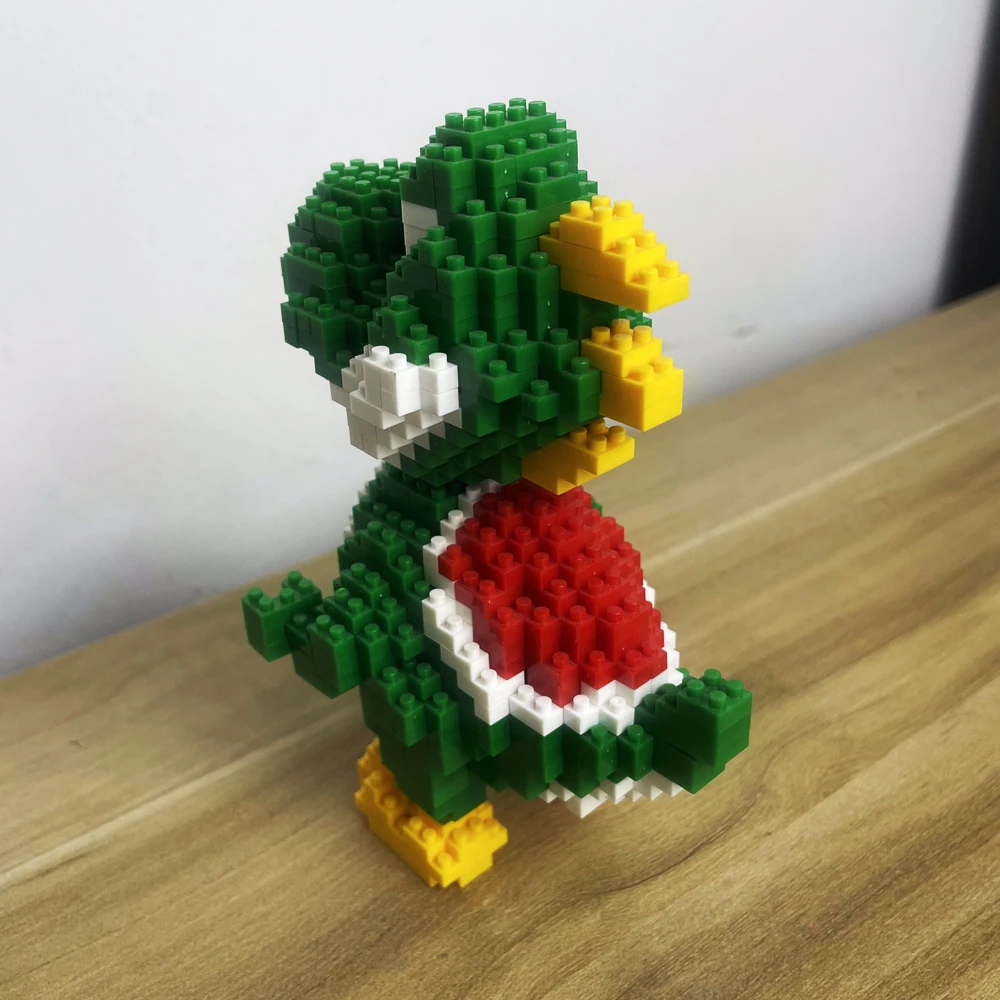 Knew Built Micro Mini Building Blocks ของเล่นสร้างป่าไดโนเสาร์สีเขียวของคุณเพื่อนเล่นเด็กที่สมบูรณ์แบบและเครื่องประดับตกแต่ง