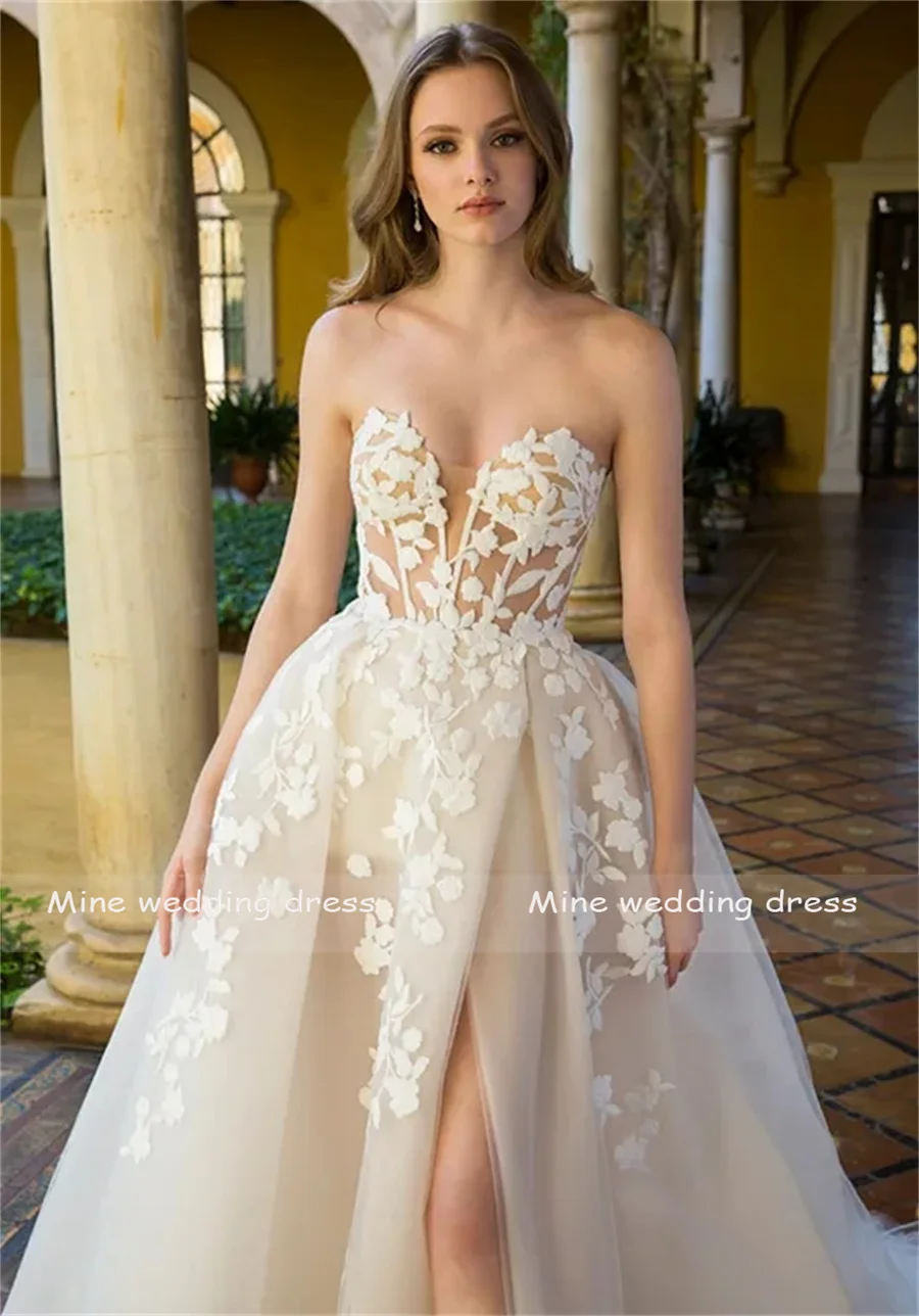 Sweetheart Lace Appliques ด้านหน้าแยกชุดแต่งงานสําหรับผู้หญิง A-Line Backless ดูผ่านและปุ่ม Custom Made ชุดเจ้าสาว