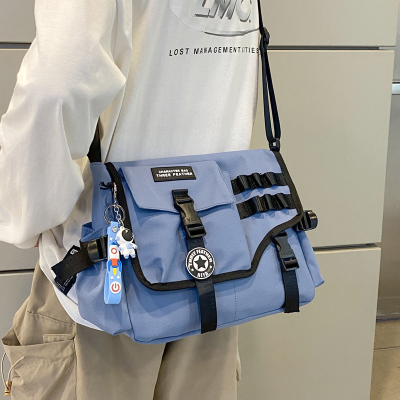 キャンバスクロスボディバッグ女性のための 2023 ナイロン男性郵便配達学生ショルダーメッセンジャーバッグ大型かばんファッションランドセルビッグハンドバッグ