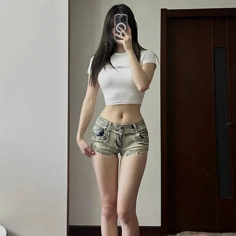 Pantalones cortos de mezclilla ajustados para mujer, ropa de calle alta Y2k, pantalones de tiro bajo, Sexy, Vintage, moda europea, envuelta en la cadera, Verano