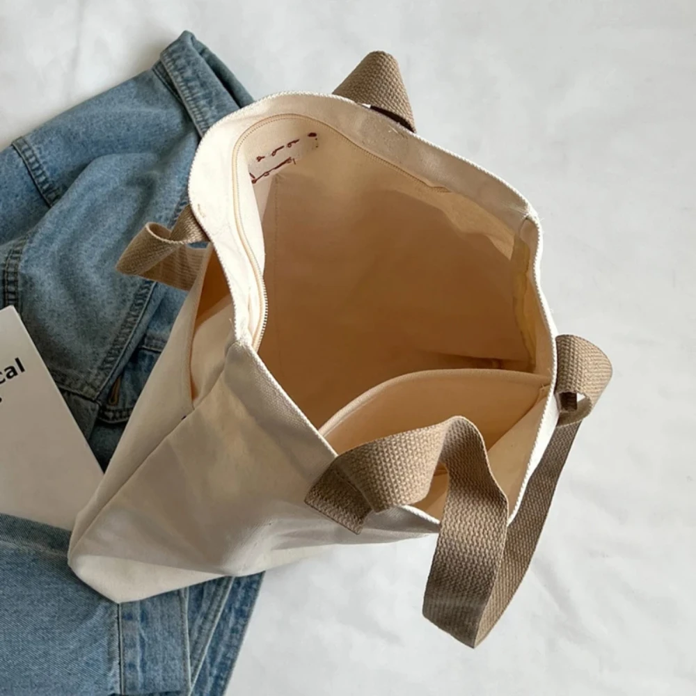 1Pc 女性用トートバッグ キャンバス縫製糸 大容量 高級感 ハンドバッグ 便利で実用的な女性の通勤バッグ