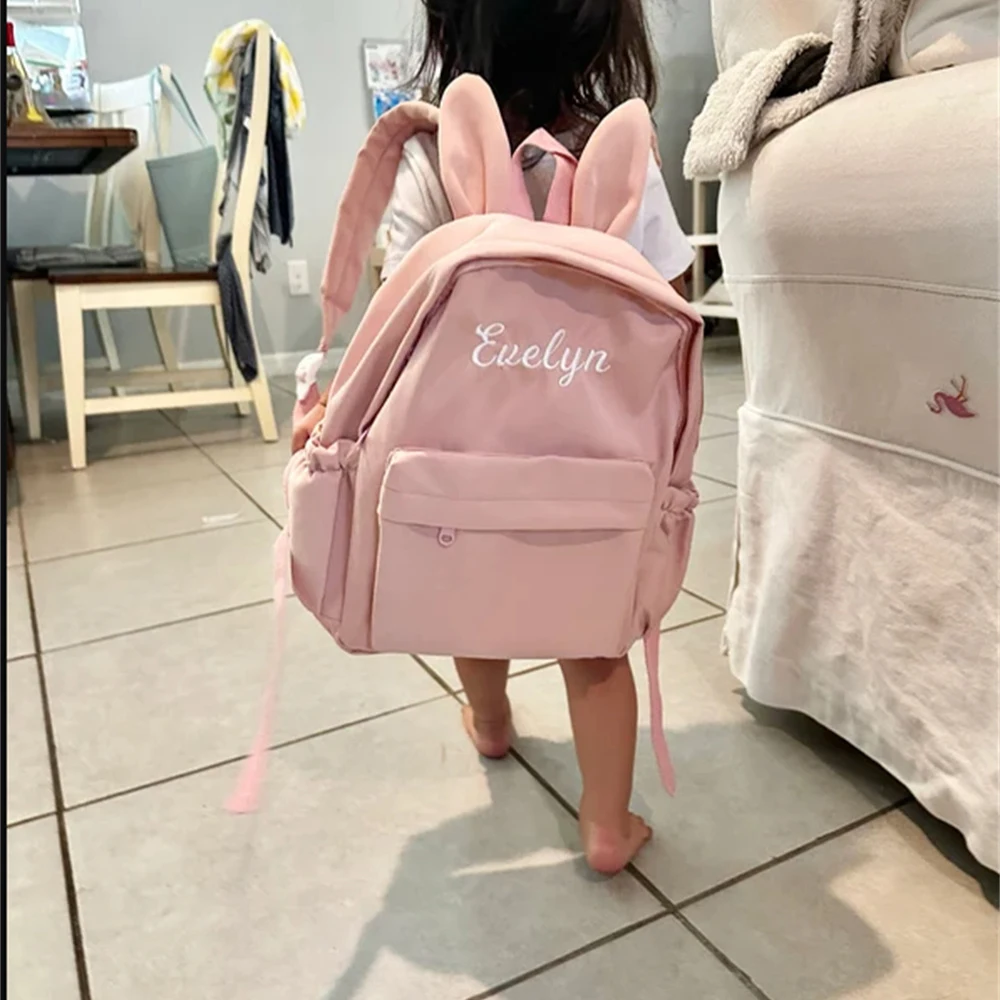 Mochila con orejas de conejo con nombre bordado, bolso de hombro personalizado para niñas, mochila escolar de nailon de gran capacidad, bolsas de viaje para mujer