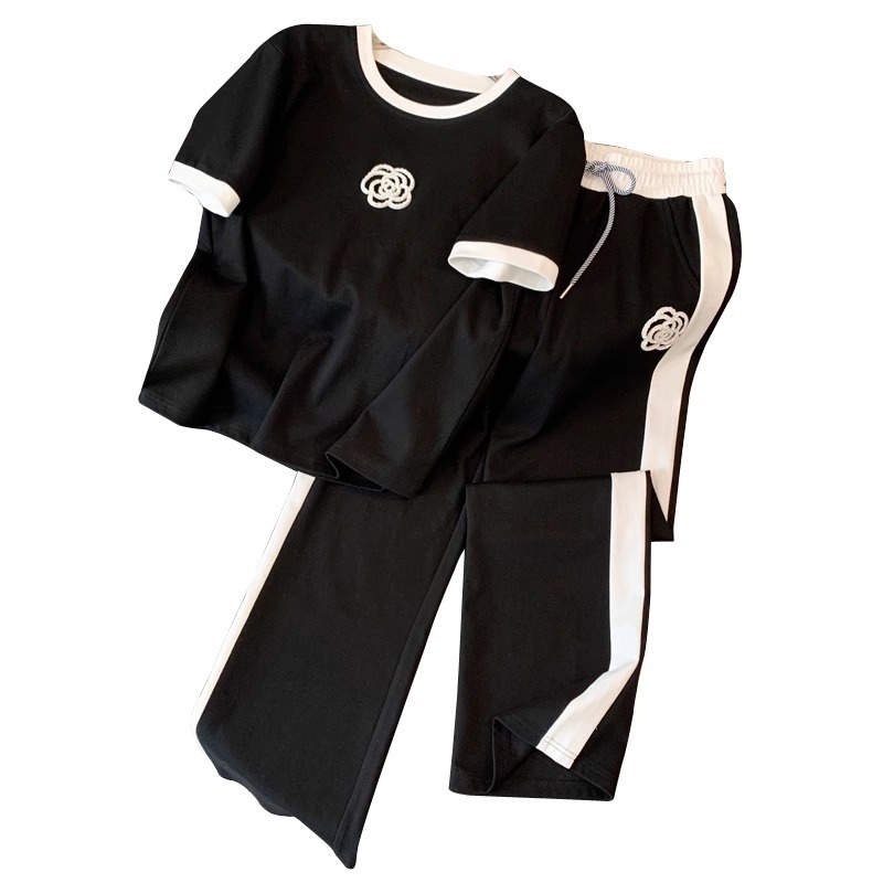 夏の女性の白黒セットラウンドネック半袖 Tシャツとパンツセット女性のための 2 ピースジャージ衣装