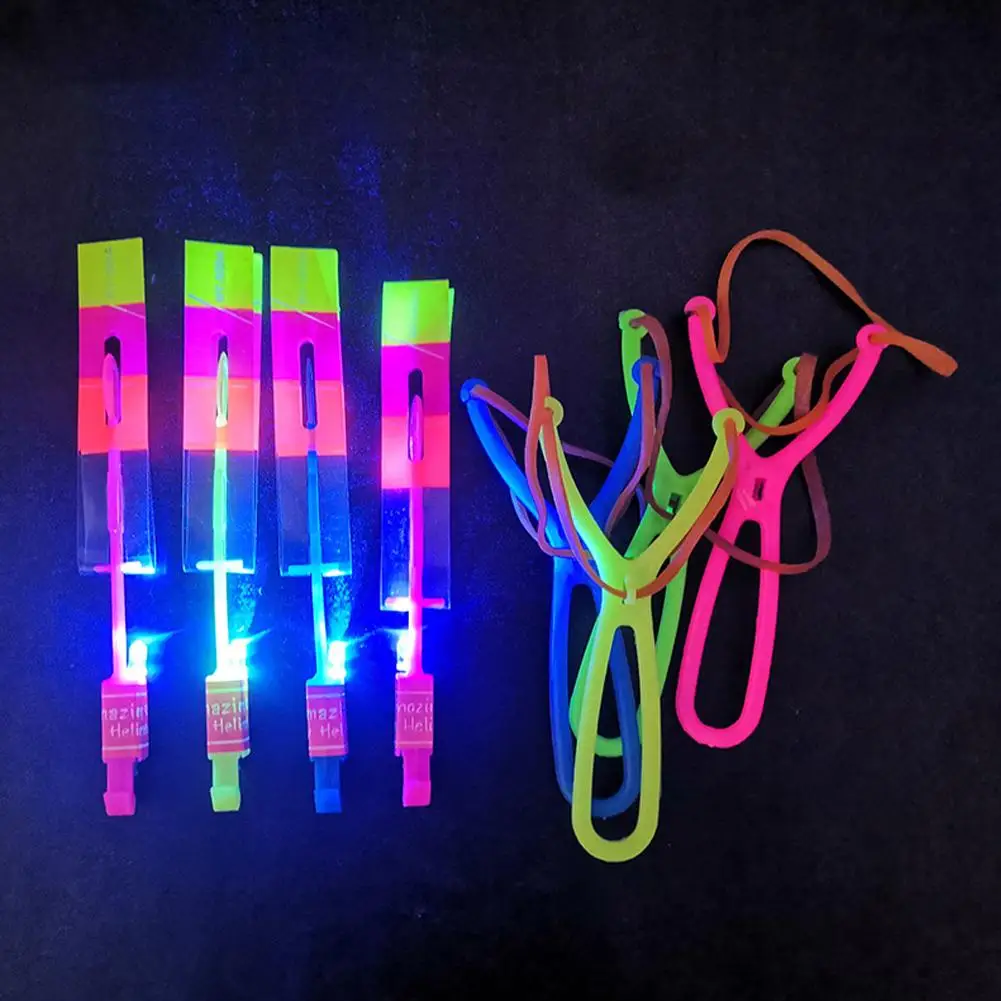 10Pcs Funny Luminous Slingshot Flying Arrow LED Light Up Flashing Dragonfly Glow For Kids Party Toys Gift Color Random