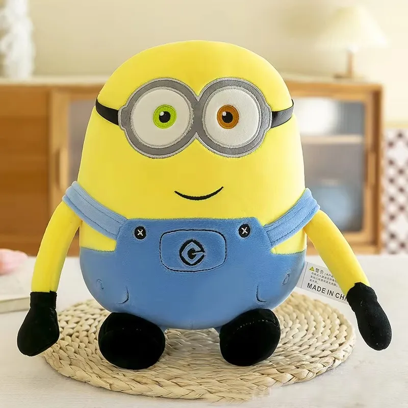 Minions ภาพยนตร์ Periphery สีเหลือง Plush Bob Plush Stuart ตุ๊กตาของเล่นในกางเกงยีนส์ตุ๊กตาหมอนตกแต่งเด็กของขวัญวันเกิด