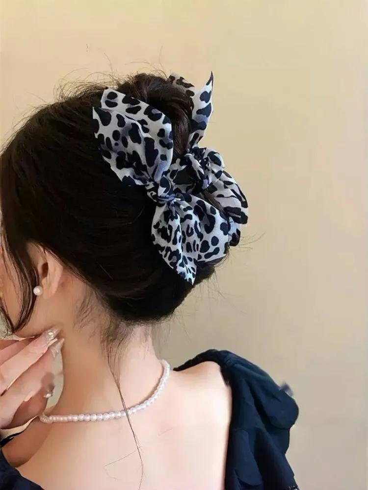 Accessori per capelli di fascia alta per donna con clip per fiocco su entrambi i lati in tessuto con stampa leopardata dal temperamento retrò