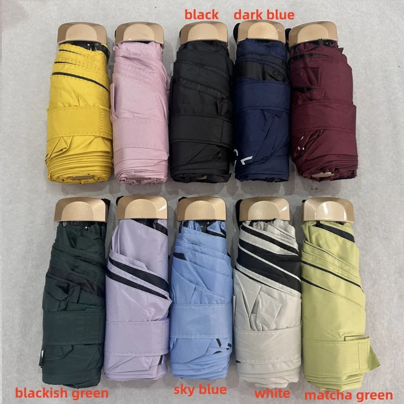 1Pc Mini Ombrellone Tasca Ombrello da pioggia Vinile Pieghevole Protezione UV dai raggi ultravioletti Parasole Tasca Ombrellone Capsula
