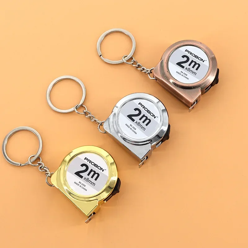 Mini metro a nastro portatile retrattile da 2 m in acciaio dolce con design portachiavi piccolo strumento di misurazione domestico per artigianato e cucito fai-da-te