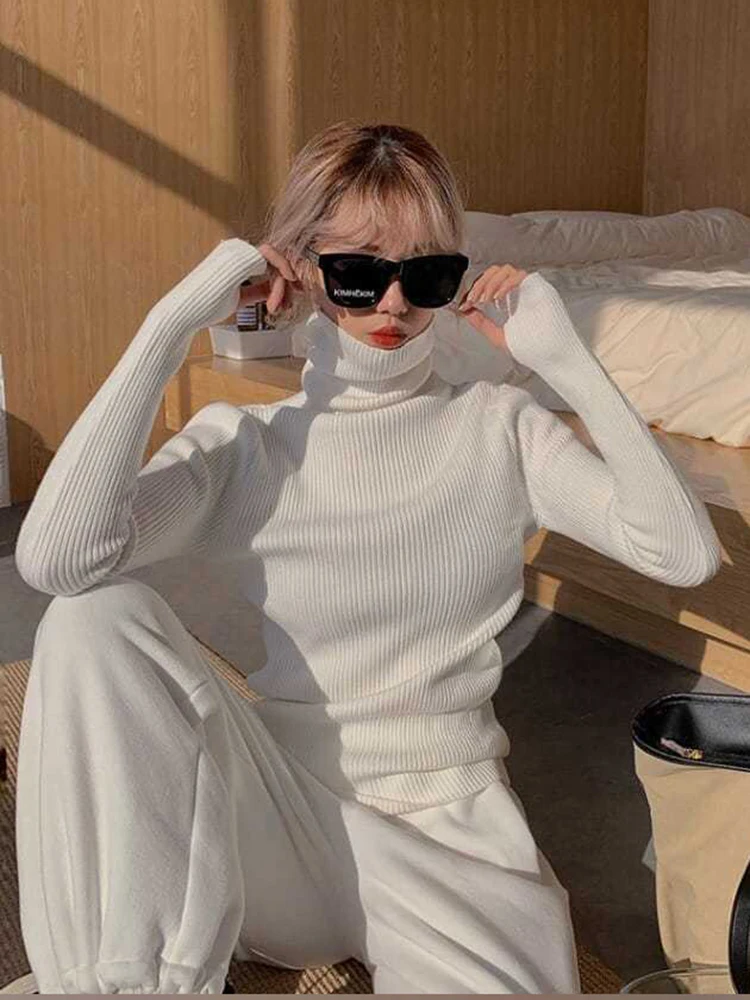 ถักเสื้อกันหนาวผู้หญิงเกาหลีรุ่นเสื้อคอเต่าฤดูหนาวสีทึบPullover SlimmingภายในLapping Warm Basic Tops