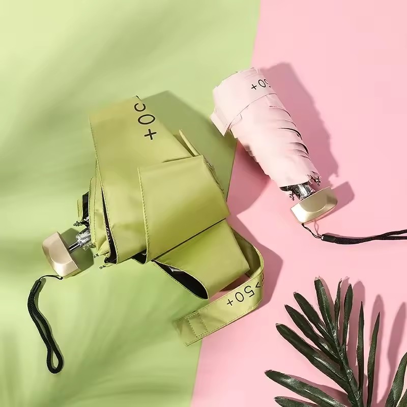 Mini paraguas de bolsillo para lluvia, sombrilla plegable de vinilo con protección ultravioleta UV, parasol de bolsillo, cápsula