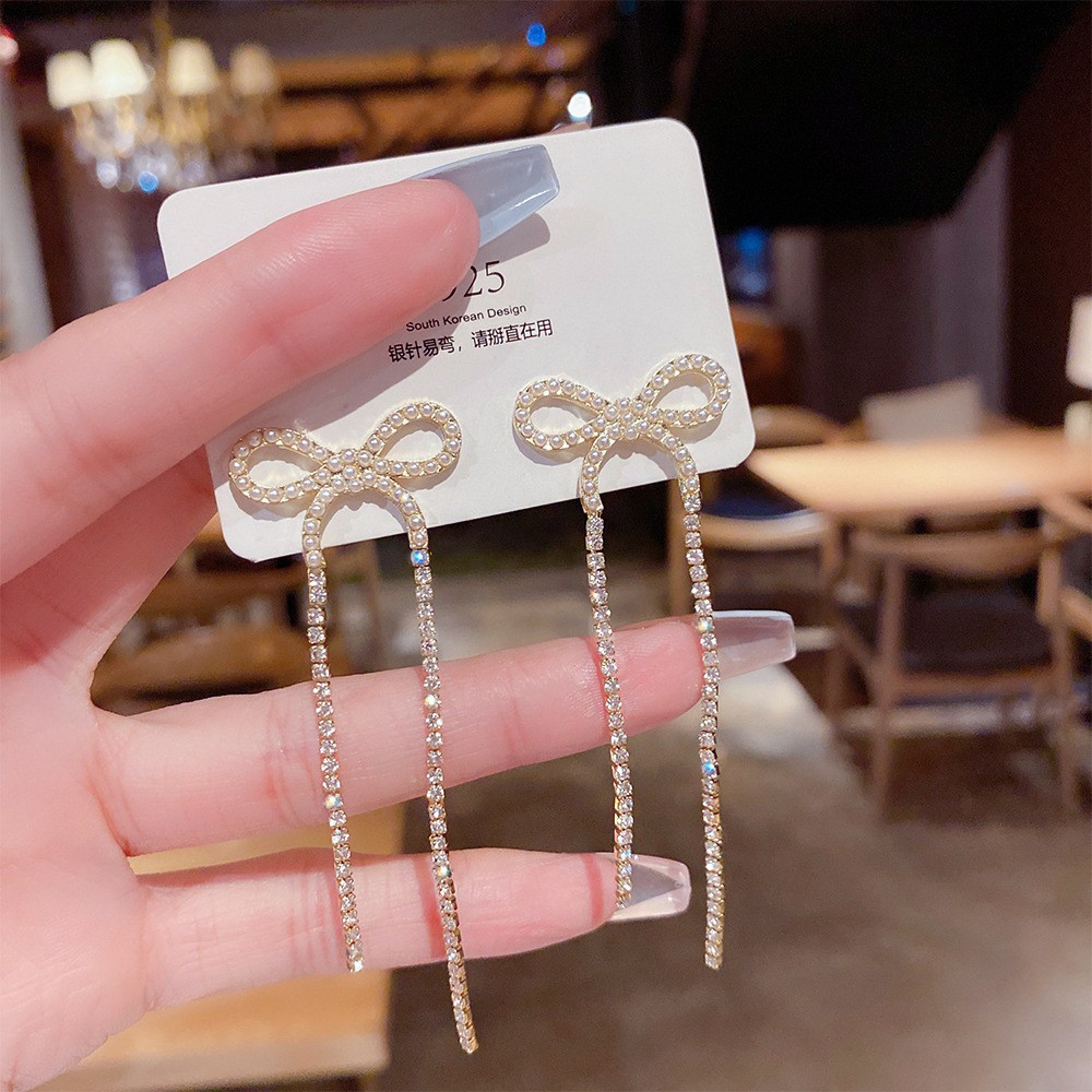 女性用ロングクリスタルボウタッセルイヤリング、925シルバー針、韓国ファッション、ラグジュアリーパールボウノット、ジュエリー、トレンド、2024