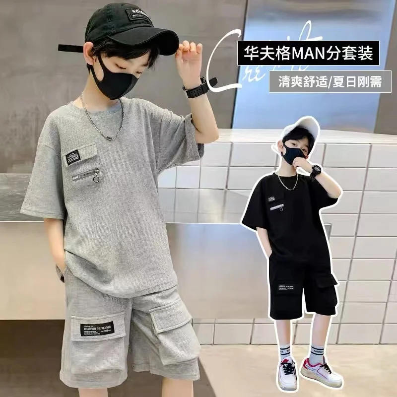 ใหม่ชุดชุดกีฬาเด็กผู้ชายชุด2ชิ้นเสื้อสูทแขนสั้นหลวม + กางเกงขาสั้นสำหรับฤดูร้อน