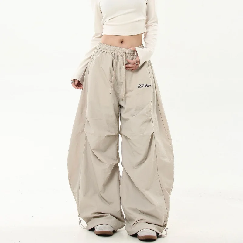 Calças de trabalho de rua retrô hip-hop americanas com uma sensação sofisticada, guarda-chuva plissado, roupa de trabalho militar, calça com cordão de cintura alta