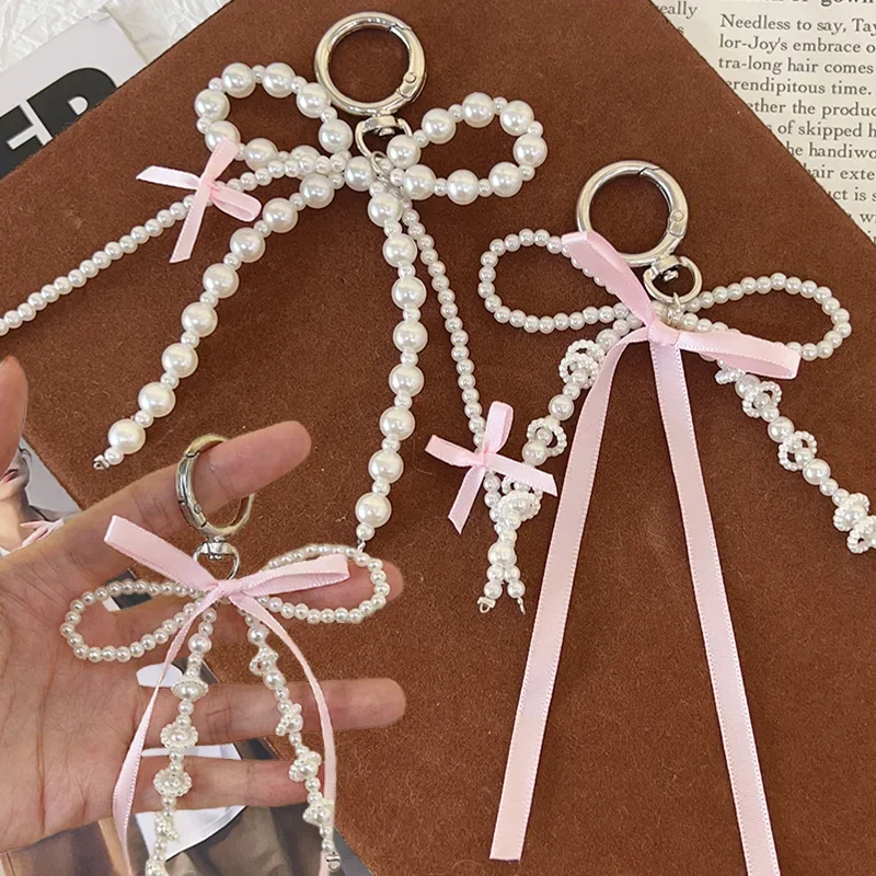 2025 nueva moda coreana dulce perla arco llavero corazón colgante llavero Y2K Ins soporte estético para niña bolso colgante Accesorios