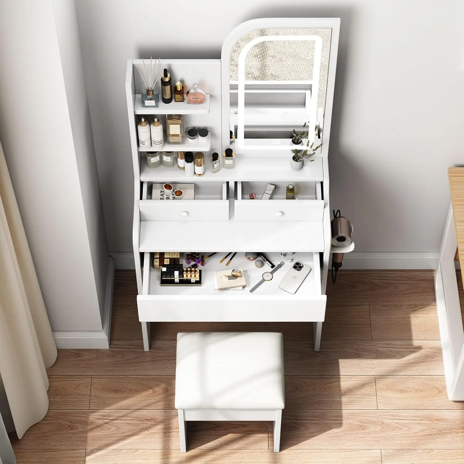A small dressing table with power socket, a mini white dressing table with mirror and light, and a stool