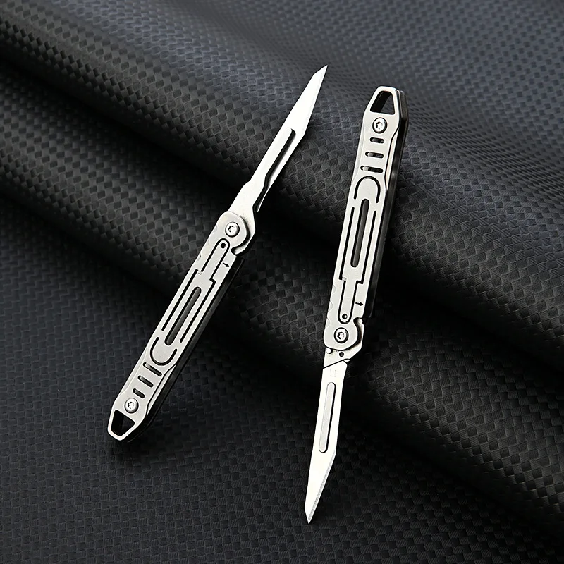 Nuevo Mini cuchillo quirúrgico plegable de aleación de titanio, cuchillo EDC portátil para acampar al aire libre, viene con 10 Uds de cuchillas gratis