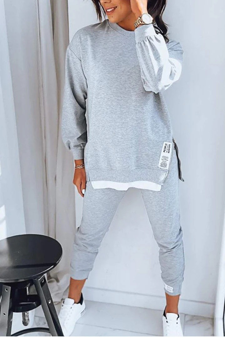Nuevo conjunto de dos piezas holgado de retazos de otoño, jersey de manga larga a la moda para mujer, traje informal con capucha, pantalones pitillo deportivos, trajes