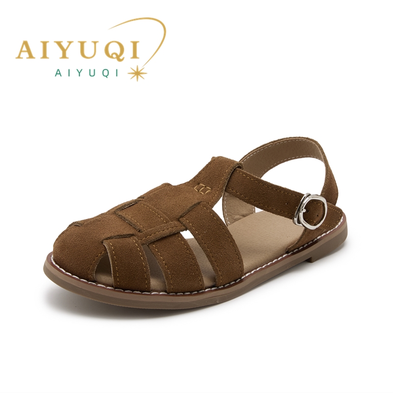 AIYUQI, sandalias Baotou huecas de cuero genuino Retro de suela plana para mujer, nuevas sandalias huecas con jaula de cerdo 2025 para mujer