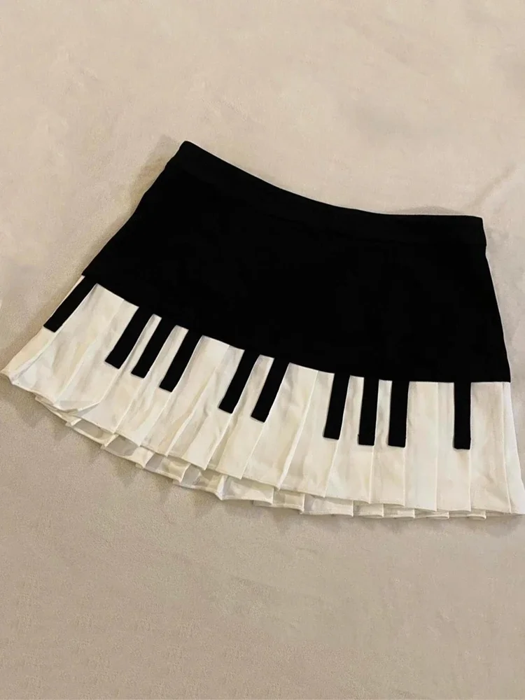 Gonna a pieghe grigia con fiocco di design Minigonna patchwork in pizzo da donna 2024 Gonna carina con stampa a pois a righe stile Lolita moda estiva 2024