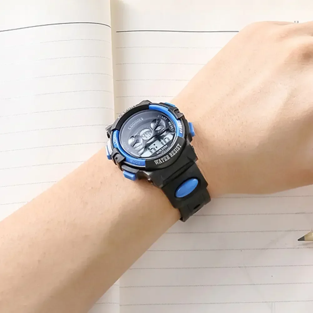เด็กนาฬิกาอิเล็กทรอนิกส์ Luminous Dial กันน้ํา Multi-Function นาฬิกาปลุก LED นาฬิกาข้อมือดิจิตอลสําหรับชายและหญิง
