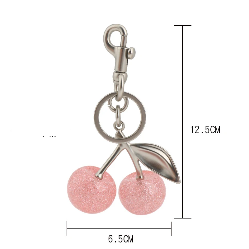 Llavero con dije de cereza de cristal rosa brillante para bolso de entrenador, bolso de hombro, llavero de cereza para mujer, pieza de fijación