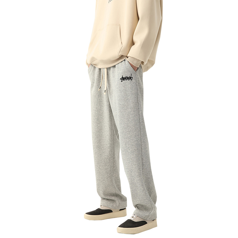 Pantalones para correr de pierna recta de color sólido para hombre, adecuados para deportes casuales como correr, gimnasio y actividades al aire libre.