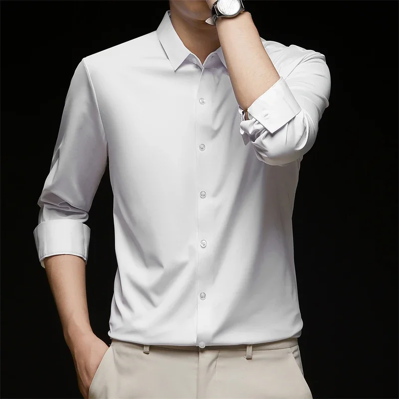 Nueva camisa informal de negocios de manga larga de Color sólido para hombre, resistente a las arrugas, cómoda, versátil para todas las estaciones