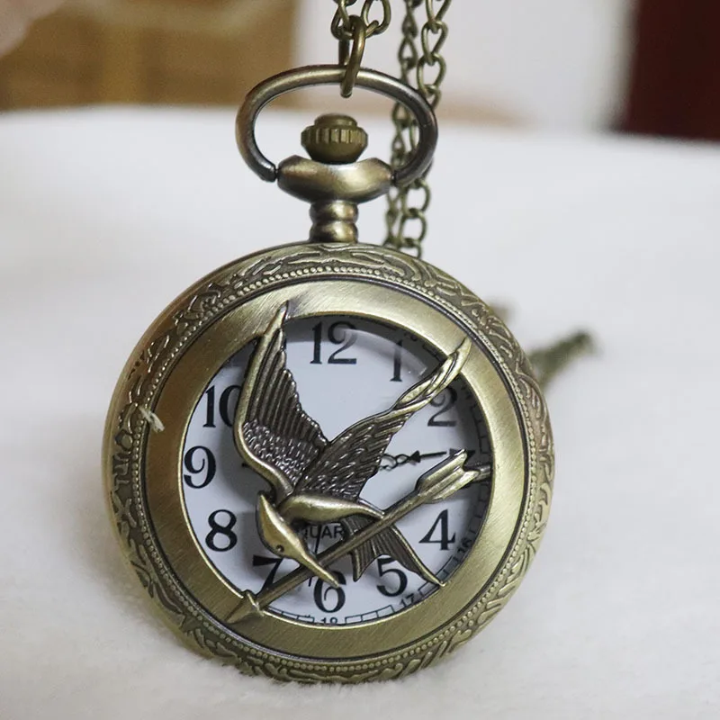 Retro-Quarz-Taschenuhr „Hunger Games“, beliebtes hohles Taschenuhr im Mockingbird-Design aus Bronze