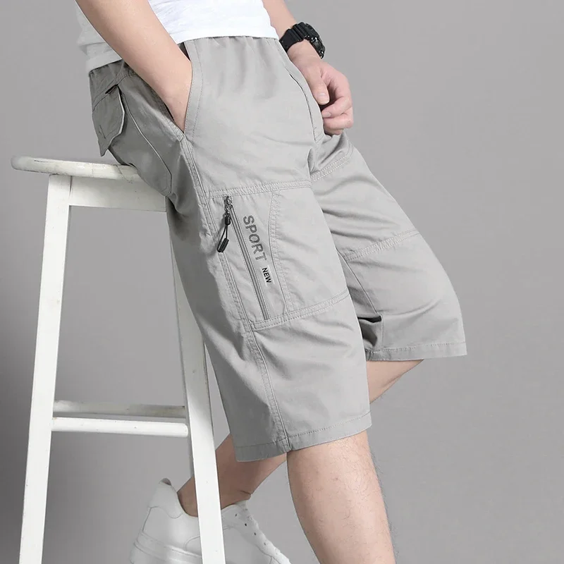 Calções de carga dos homens calças de joelho bolso com zíper verão shorts de algodão escalada jogger cintura elástica esportes wear casual calças curtas