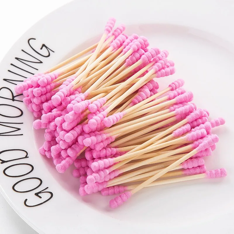 Hisopo de algodón desechable de doble cabeza para mujer, palo de algodón en espiral de colores para recoger las orejas, producto de higiene para el hogar, 100 piezas